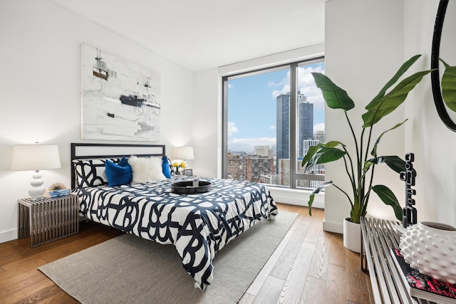 bedroom featuring wood-type flooring