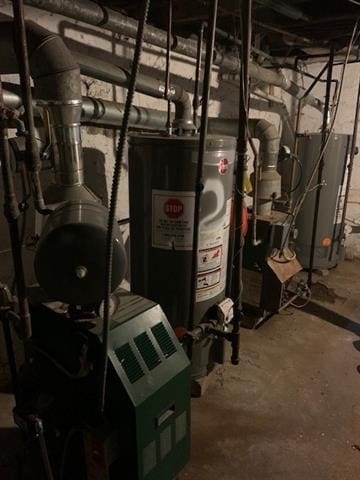 798 Grand St, Jersey City, NJ 07304 - utility room featuring gas water heater and water heater