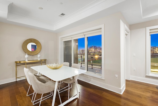 150 Henley Pl Unit 201, Weehawken, NJ 07086 - dining space with hardwood / wood-style floors, baseboards, and a tray ceiling