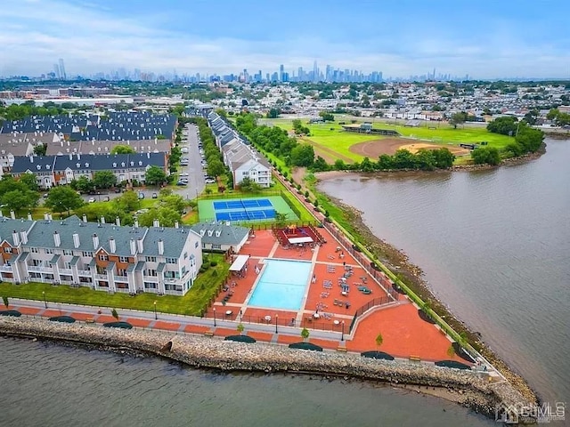 aerial view featuring a water view and a view of city