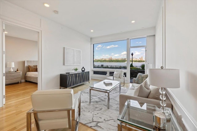9 Somerset Ln Unit 118, Edgewater, NJ 07020 - living area with light wood finished floors and recessed lighting