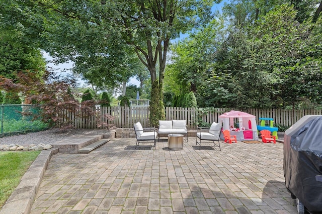 11 Dean Ct, Rutherford, NJ 07070 - fenced backyard featuring a patio area, an outdoor living space, and grilling area