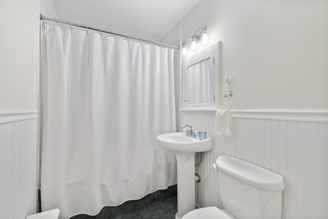 11 Dean Ct, Rutherford, NJ 07070 - full bath featuring a wainscoted wall, tile patterned floors, and shower / bath combo