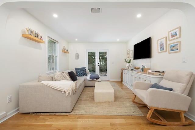 11 Dean Ct, Rutherford, NJ 07070 - living room with light wood-style flooring, recessed lighting, and french doors
