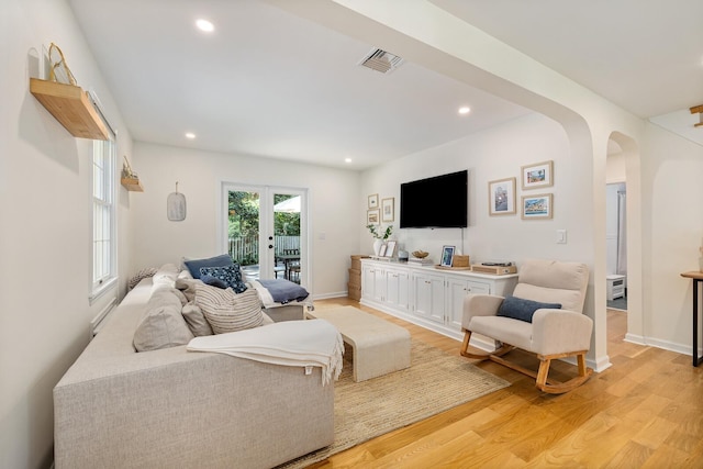 11 Dean Ct, Rutherford, NJ 07070 - living area featuring arched walkways, light wood-style flooring, and recessed lighting