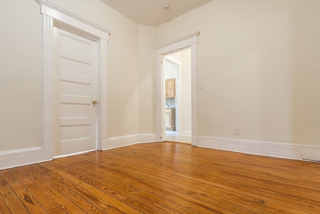 179 Beacon Ave, Jersey City, NJ 07306 - empty room with light wood finished floors and baseboards