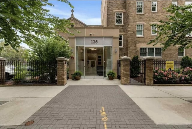 126 Delaware Ave Unit 12, Jersey City, NJ 07306 - property entrance featuring brick siding and a gate