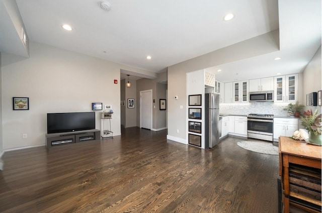 126 Delaware Ave Unit 12, Jersey City, NJ 07306 - living room with recessed lighting and dark wood-type flooring