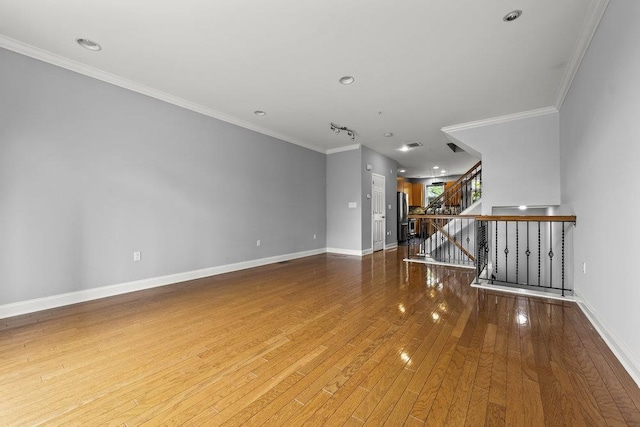 235 Price Ct, West New York, NJ 07093 - unfurnished room with stairs, hardwood / wood-style flooring, crown molding, and recessed lighting