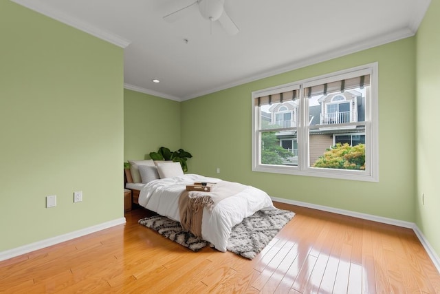 235 Price Ct, West New York, NJ 07093 - bedroom featuring ornamental molding, wood finished floors, and a ceiling fan
