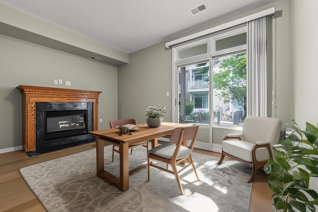 235 Price Ct, West New York, NJ 07093 - office with a high end fireplace and light wood-style floors