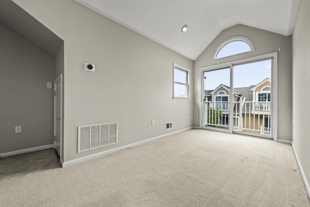 235 Price Ct, West New York, NJ 07093 - carpeted empty room with baseboards and high vaulted ceiling