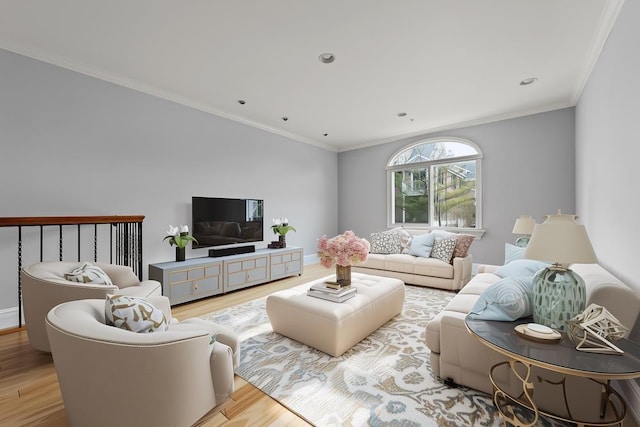 235 Price Ct, West New York, NJ 07093 - living area with wood finished floors, crown molding, and recessed lighting
