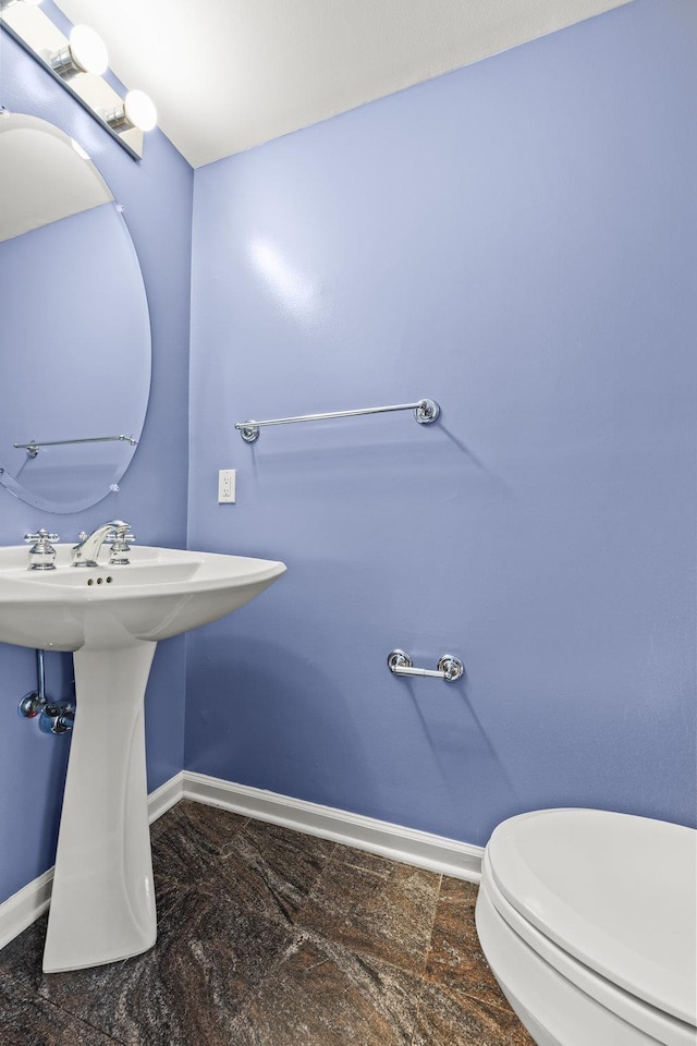 235 Price Ct, West New York, NJ 07093 - half bathroom with baseboards