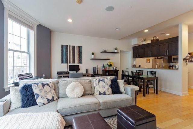 102 Tidewater St Unit 2B, Jersey City, NJ 07302 - living room featuring light wood-style floors, recessed lighting, and baseboards
