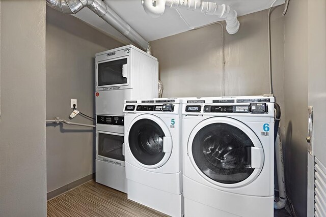 380 Mountain Rd Unit 210, Union City, NJ 07087 - community laundry room featuring washing machine and clothes dryer and stacked washer / drying machine