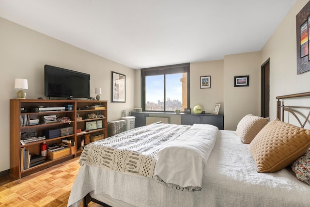 carpeted bedroom with radiator