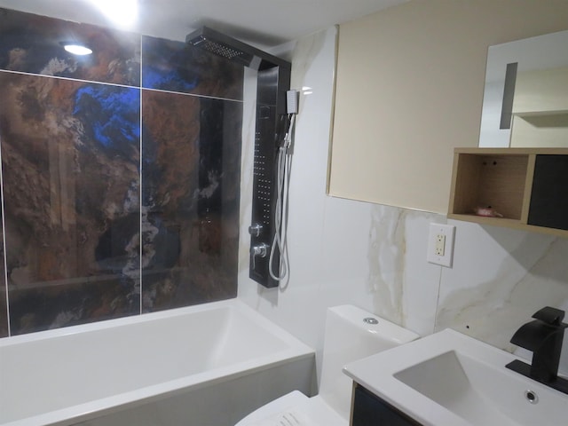 full bathroom featuring vanity, toilet, and washtub / shower combination