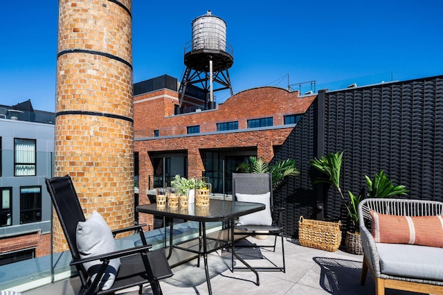 view of patio featuring outdoor dining area