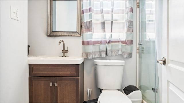 2212 Grand Ave, North Bergen, NJ 07047 - bathroom with vanity, toilet, and an enclosed shower