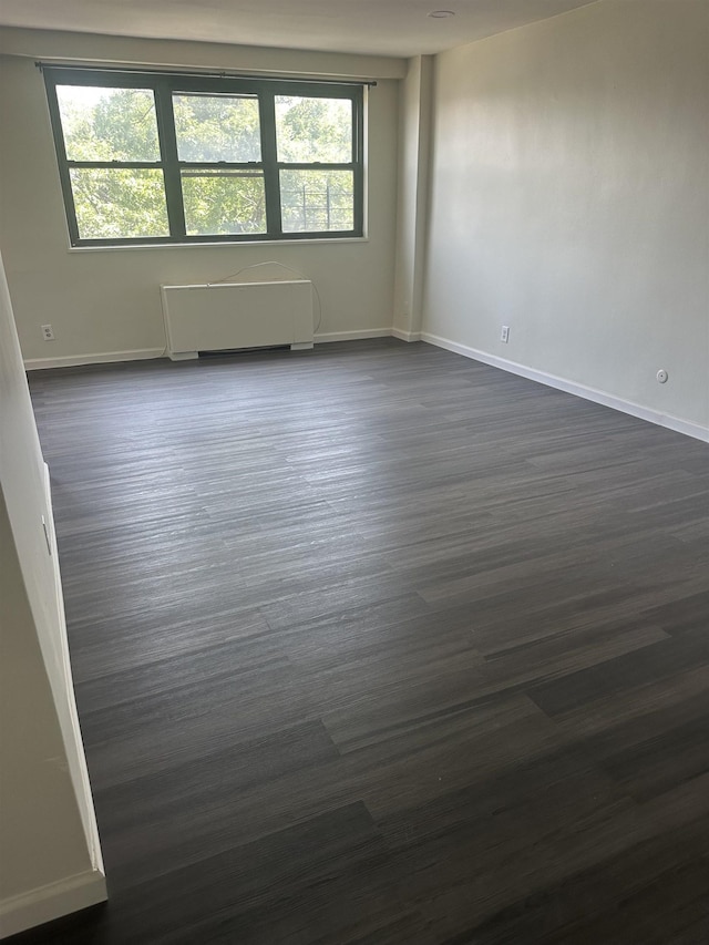 1225 Kennedy Blvd Unit 4J, Bayonne, NJ 07002 - unfurnished room with dark wood-style flooring