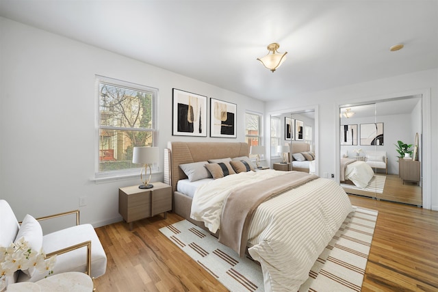 bedroom with light wood-type flooring