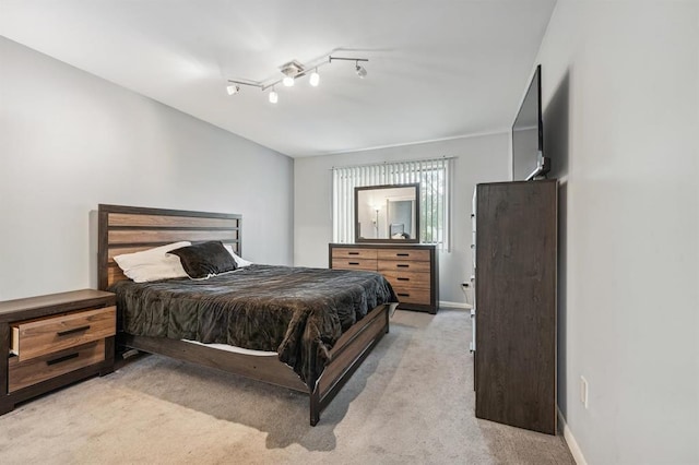 603 55th St Unit 210, West New York, NJ 07093 - bedroom with light carpet and baseboards