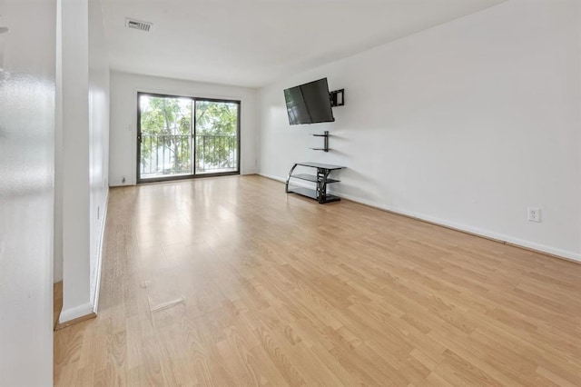 603 55th St Unit 210, West New York, NJ 07093 - unfurnished living room featuring light wood-type flooring