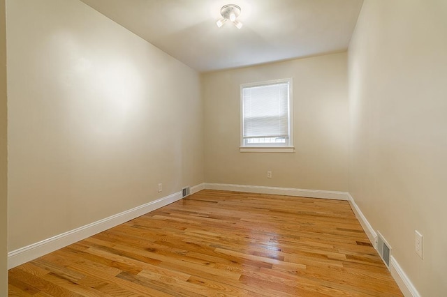 330 2nd St, Jersey City, NJ 07302 - spare room with light wood-type flooring and baseboards