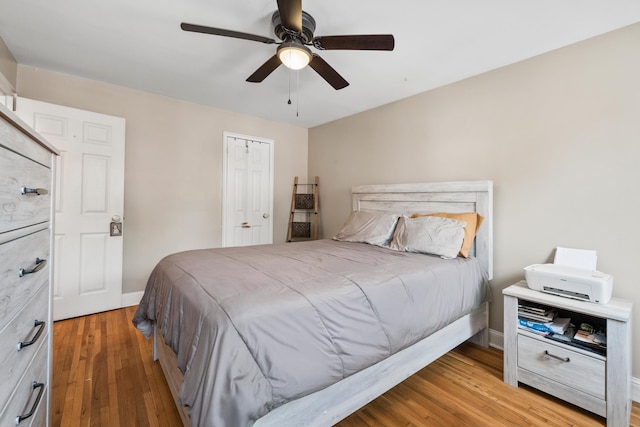 12 Egan Ct, Bayonne, NJ 07002 - bedroom featuring wood finished floors, a ceiling fan, and a closet