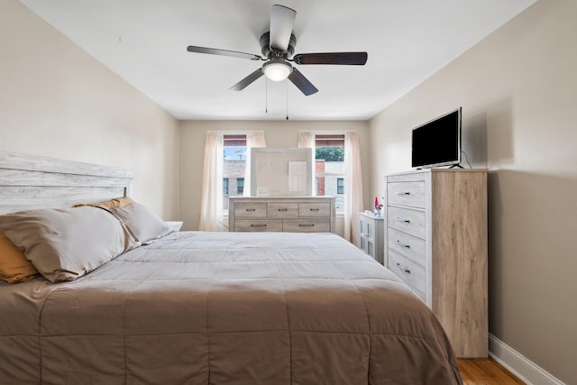 12 Egan Ct, Bayonne, NJ 07002 - bedroom featuring wood finished floors and a ceiling fan