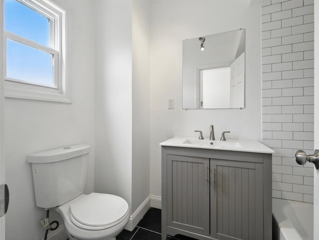 522 Jefferson St Unit 3, Hoboken, NJ 07030 - bathroom with vanity, toilet, tile patterned floors, baseboards, and bathing tub / shower combination
