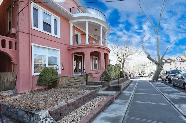 exterior space with a balcony