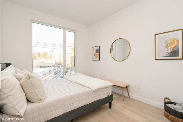 425 3rd St Unit 318, Jersey City, NJ 07302 - bedroom featuring light wood-type flooring and baseboards