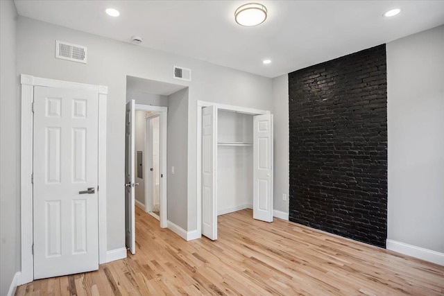 159 14th St Unit 4R, Hoboken, NJ 07030 - unfurnished bedroom with light wood-style flooring, a closet, and recessed lighting