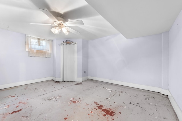 11 Veterans Ct, Bayonne, NJ 07002 - bonus room with concrete flooring and a ceiling fan