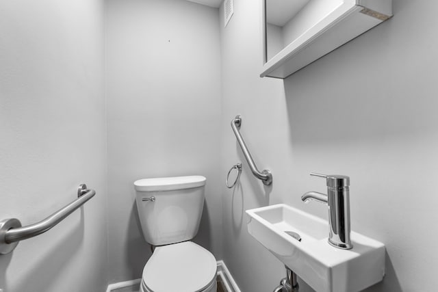 11 Veterans Ct, Bayonne, NJ 07002 - half bath featuring toilet and a sink