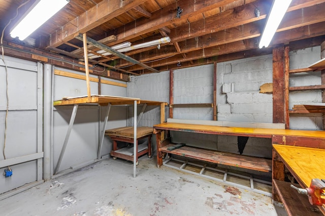 11 Veterans Ct, Bayonne, NJ 07002 - unfinished basement featuring a workshop area