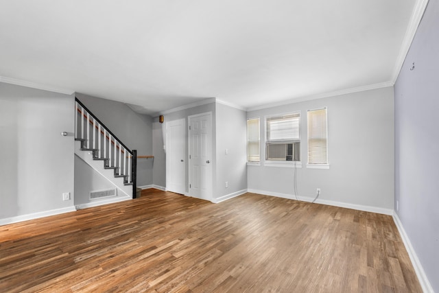 11 Veterans Ct, Bayonne, NJ 07002 - unfurnished living room featuring stairs, wood finished floors, cooling unit, and ornamental molding