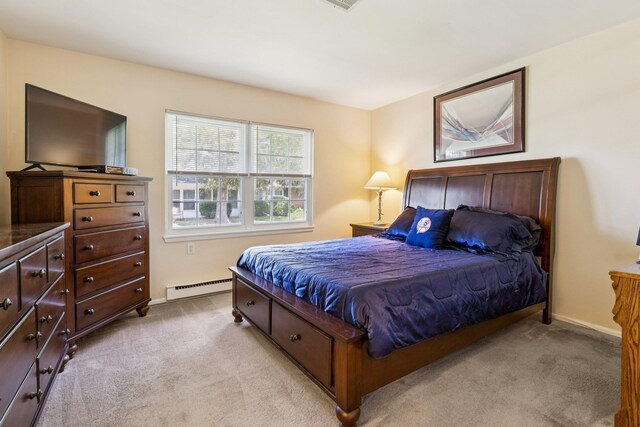 1072 Argyll Cir, Lakewood Township, NJ 08701 - bedroom featuring a baseboard radiator, light colored carpet, and baseboards