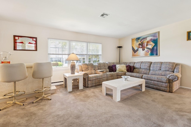 1072 Argyll Cir, Lakewood Township, NJ 08701 - living area with light colored carpet and a baseboard heating unit