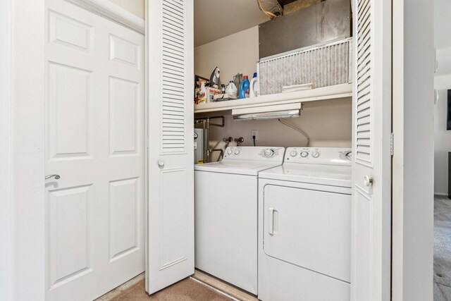 1072 Argyll Cir, Lakewood Township, NJ 08701 - washroom featuring washing machine and clothes dryer and light colored carpet
