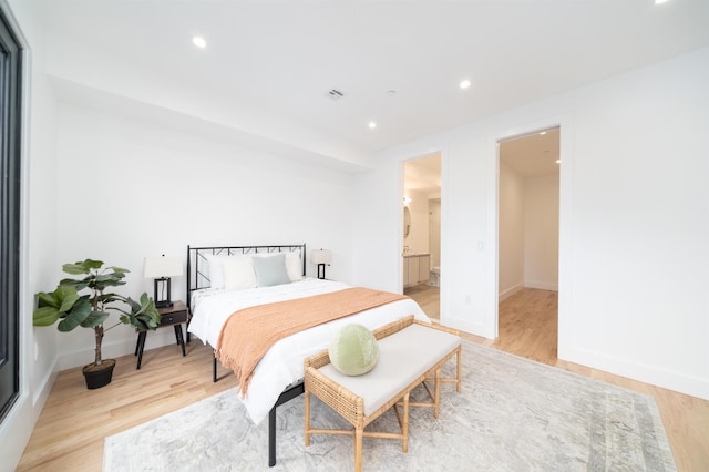 90 Monroe St Unit 2, Hoboken, NJ 07030 - bedroom featuring light wood finished floors, recessed lighting, and baseboards