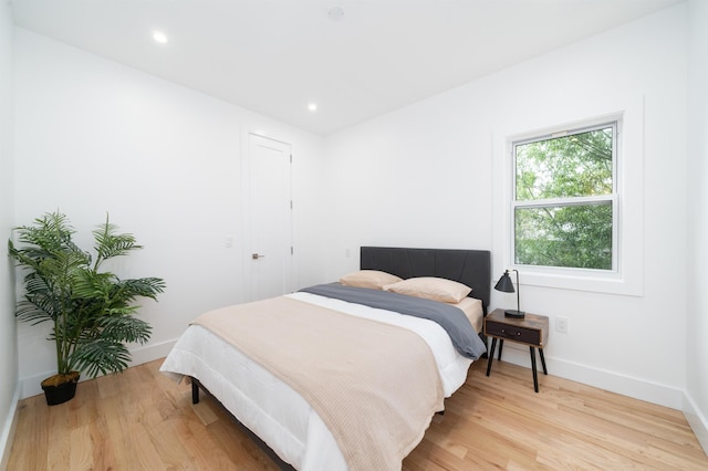 90 Monroe St Unit 2, Hoboken, NJ 07030 - bedroom with light wood-style floors, baseboards, and recessed lighting