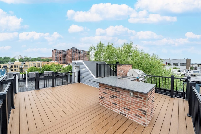 90 Monroe St Unit 2, Hoboken, NJ 07030 - wooden deck with a sink, exterior kitchen, and a grill