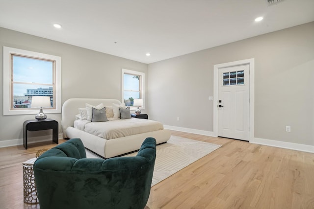 bedroom with light hardwood / wood-style flooring