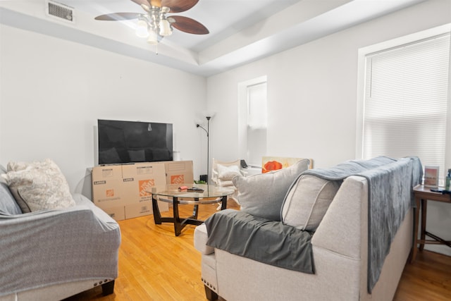 218 68th St, Guttenberg, NJ 07093 - living room with ceiling fan and light wood-style floors