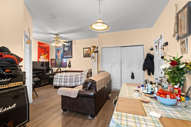 218 68th St, Guttenberg, NJ 07093 - living area with ceiling fan and wood finished floors