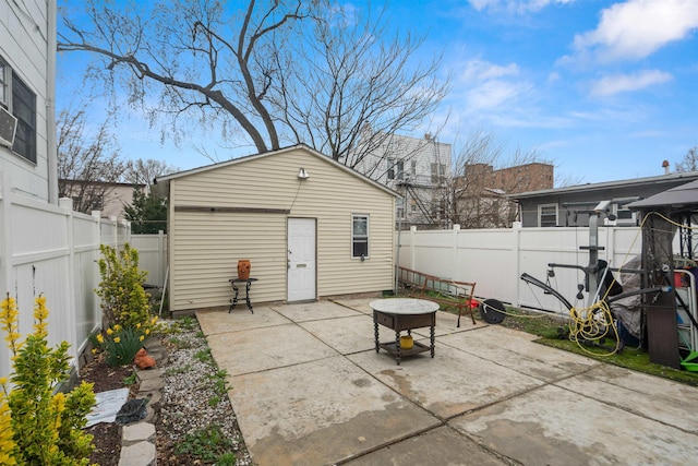 218 68th St, Guttenberg, NJ 07093 - fenced backyard featuring a patio area and an outbuilding