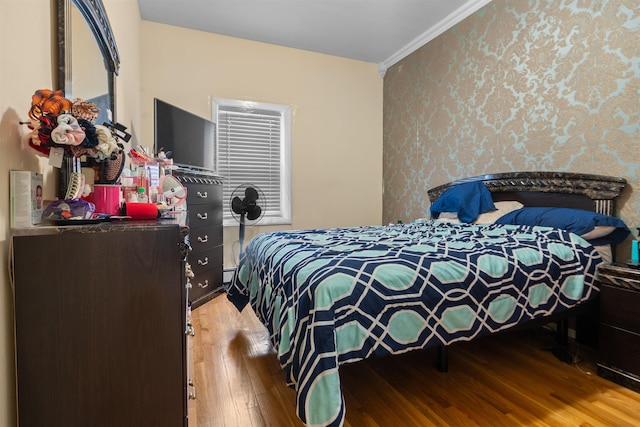218 68th St, Guttenberg, NJ 07093 - bedroom with wood finished floors and ornamental molding
